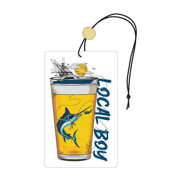 Air freshener with a design of a glass of beer, sailboat, and marlin fish with 'LOCAL BOY' text.