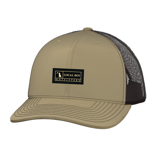 Beige and black cap with 'Local Boy Outfitters' logo displayed on a white background