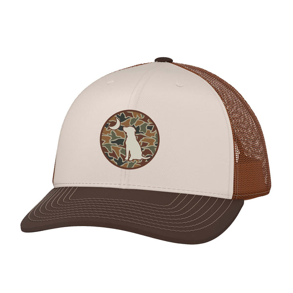 Trucker hat with brown mesh back and beige front, featuring a logo on a white background.