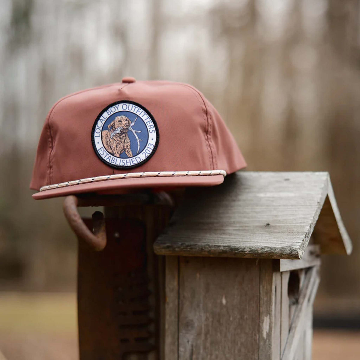 Local boy outfitters Antler Retriever Rope Hat in brick brown
