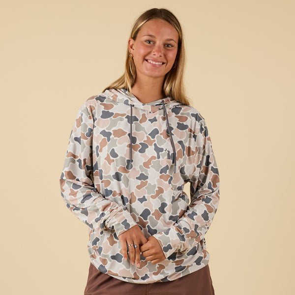 Front view of Local Boy Outfitters Floralocalflage performance hoodie with drawstrings.