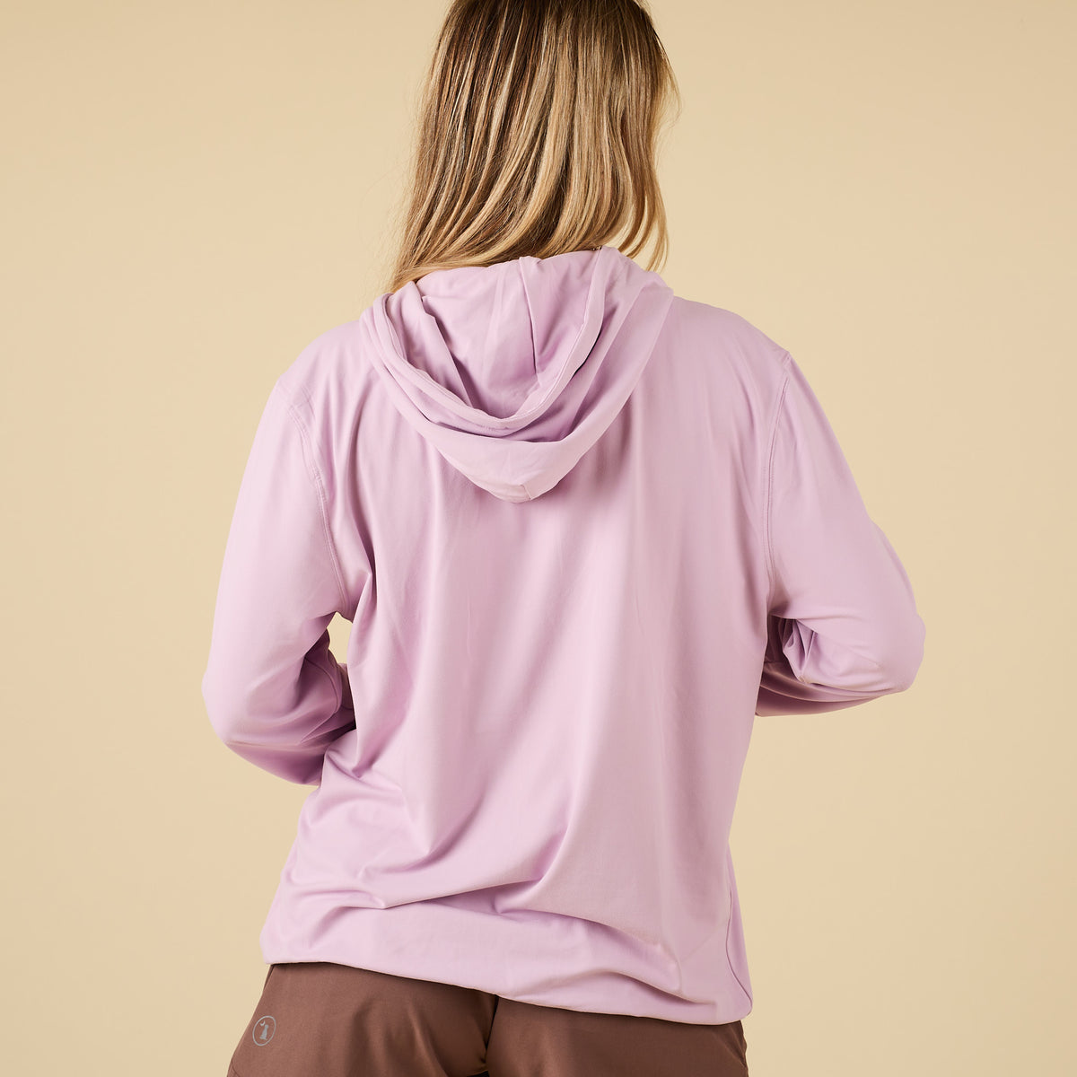 Back view of Local Girl Outfitters performance hoodie in Orchid with hood down.