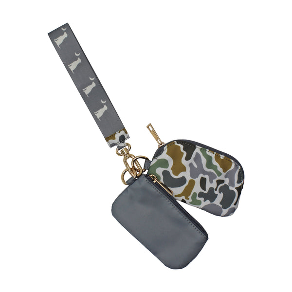 Dual Wristlet in grey and localflage bluff with two detachable zippered pouches and a wrist lanyard for easy use.