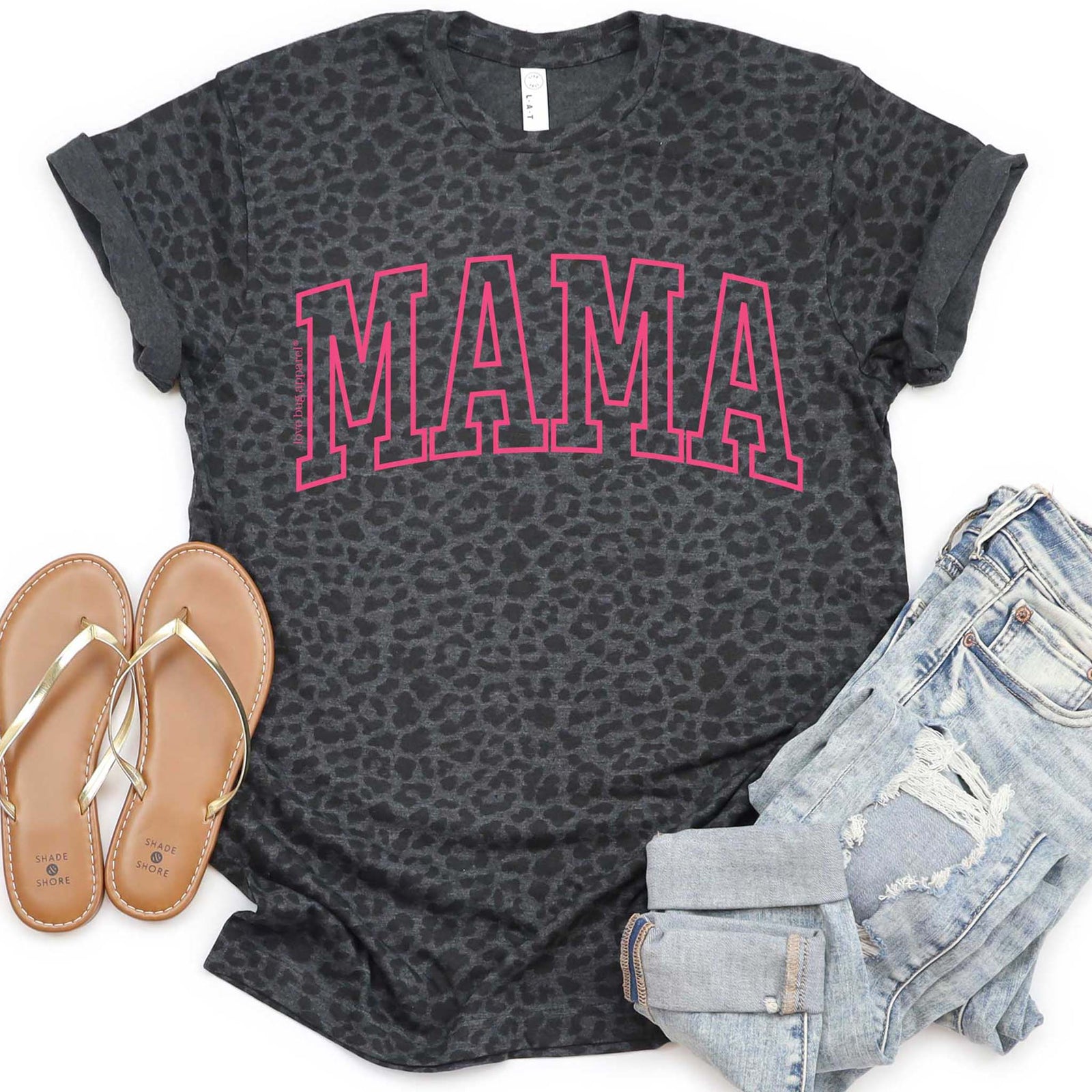 Mama Arch Graphic T-Shirt – A soft cotton short-sleeve tee featuring the word 'Mama' in bold, arched lettering. Classic crew neckline and relaxed fit, perfect for casual, everyday wear.