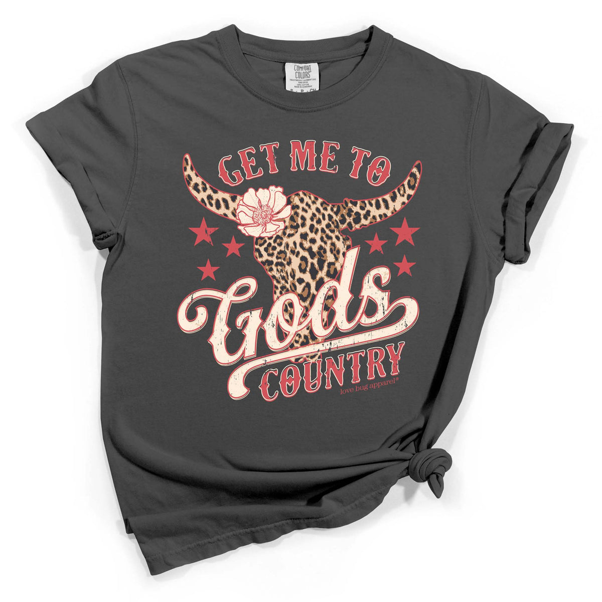 Dark gray short sleeve t-shirt with red and cream text reading “Get Me to God’s Country” and a leopard print longhorn graphic with stars.