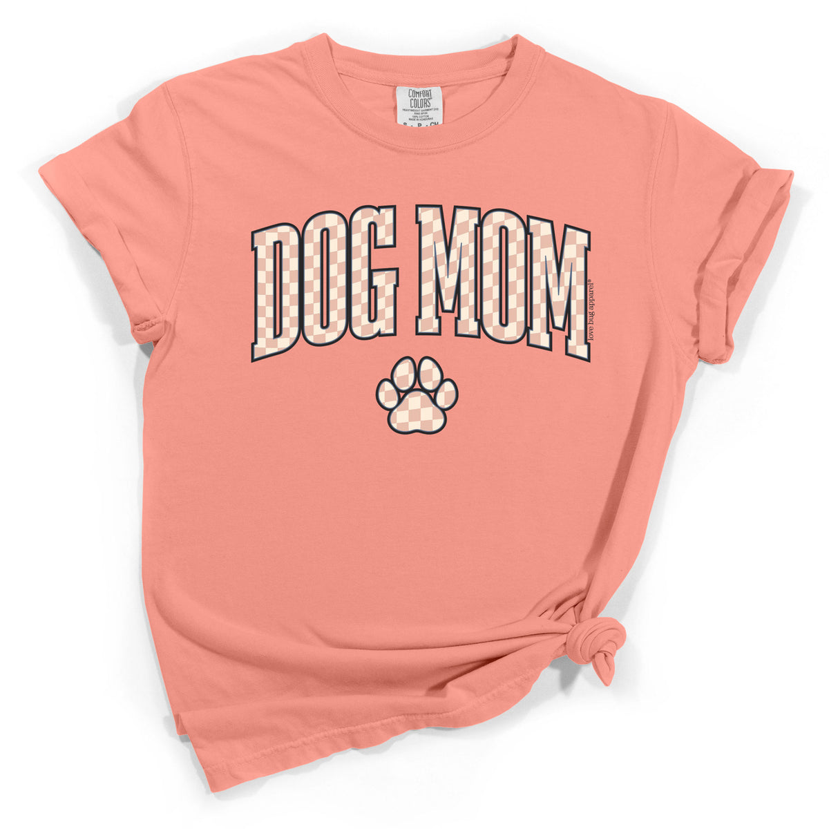 Coral t-shirt with 'DOG MOM' text and paw print on a white background