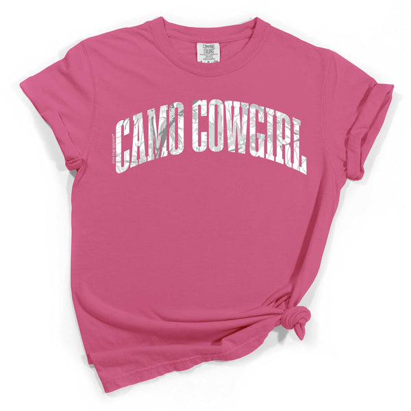 Pink t-shirt with 'Camo Cowgirl' text on a white background