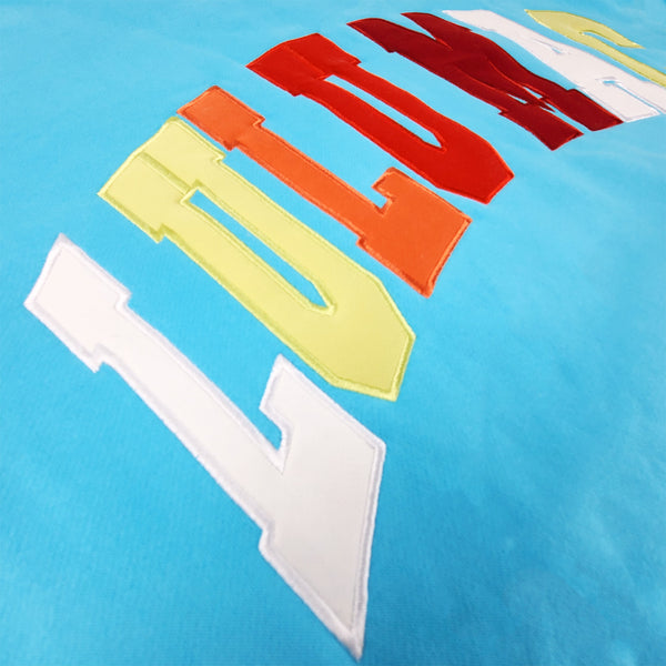 Lulu Mac Multi Color Applique Crewneck Sweatshirt in Light Blue