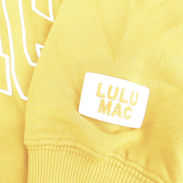 Lulu Mac Open Letter Mockneck Sweatshirt in Yellow