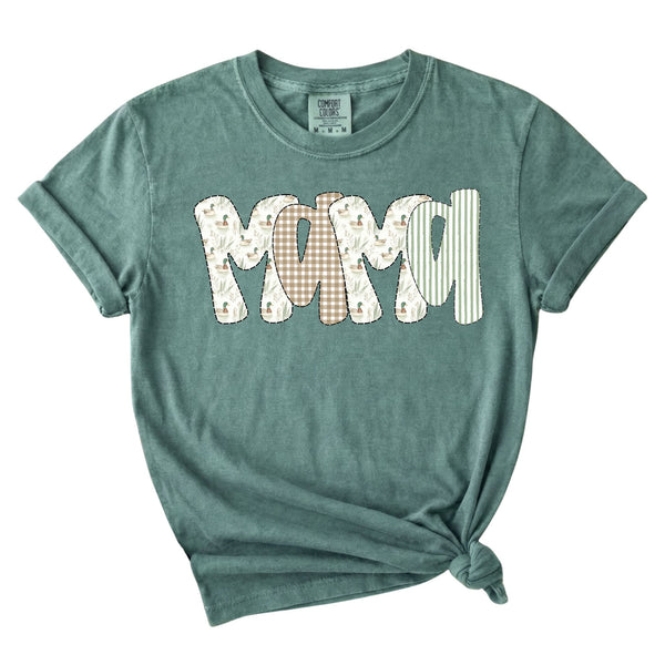 Light green t-shirt with “Mama” text in patchwork-style letters featuring duck and gingham patterns.