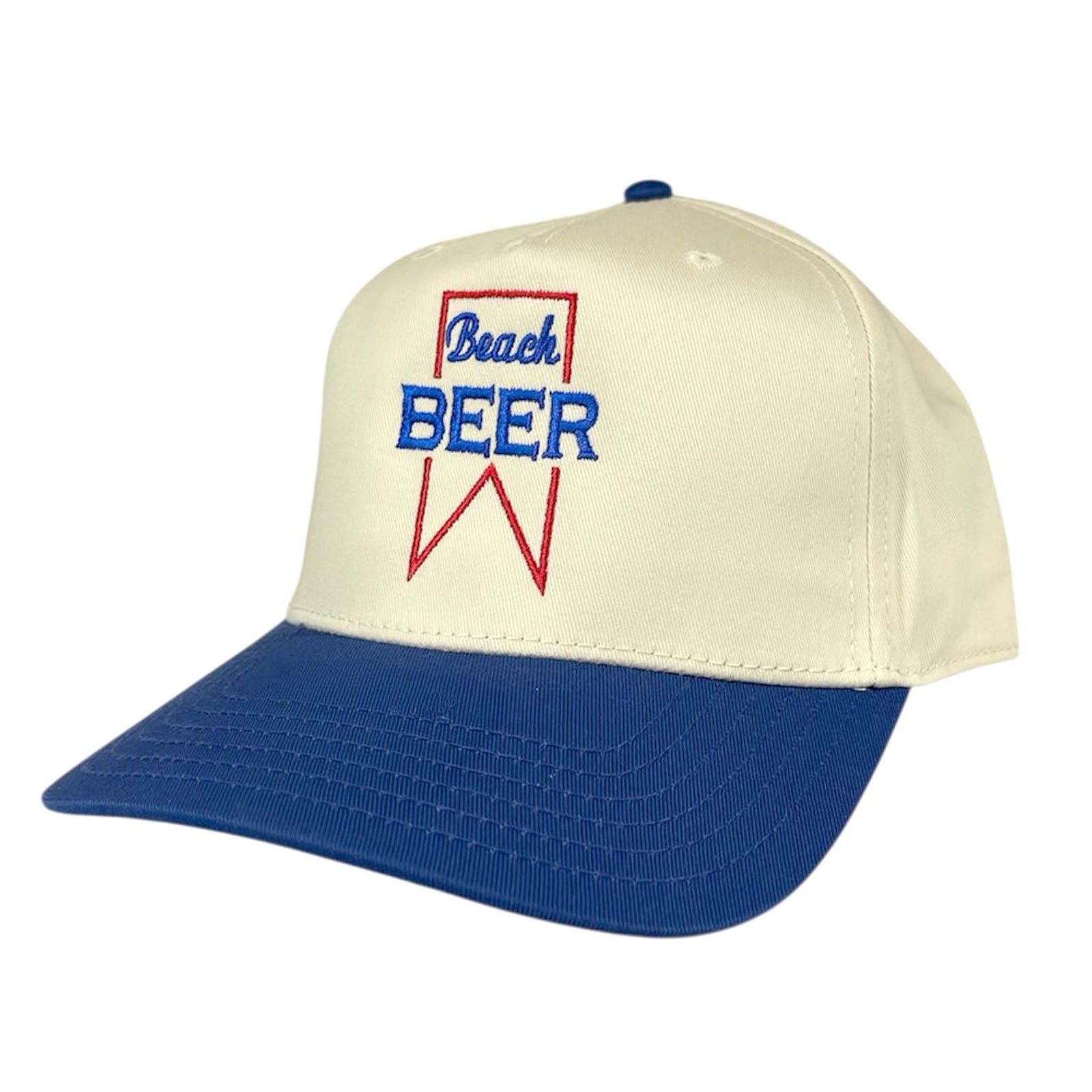 Madley Beach Beer Hat with an ivory crown, blue brim, and red and blue embroidered 'Beach Beer' logo on the front.