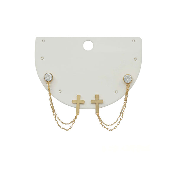 Pair of gold-tone chain drop earrings featuring clear crystal studs connected to gold cross charms by double layered chains, displayed on a white earring card.