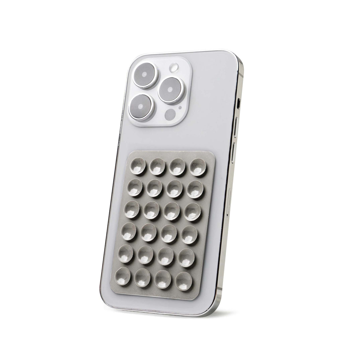 Gray Tentacle Tech suction phone mount with strong suction cup design placed on the back of a phone.