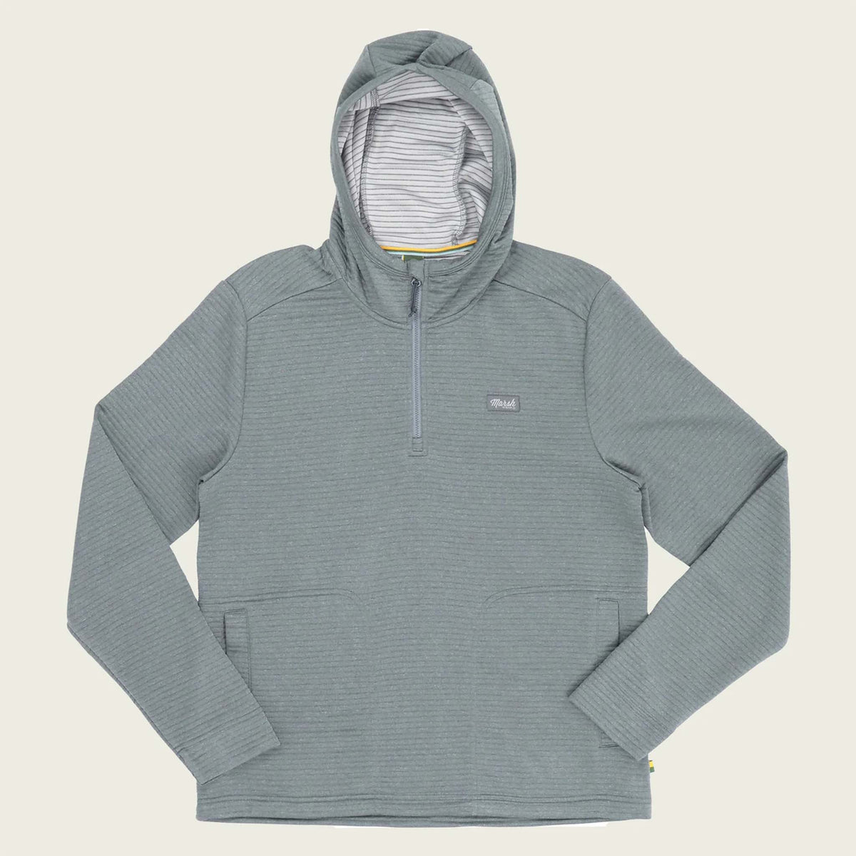 Gray hooded pullover with a brand logo on a beige background