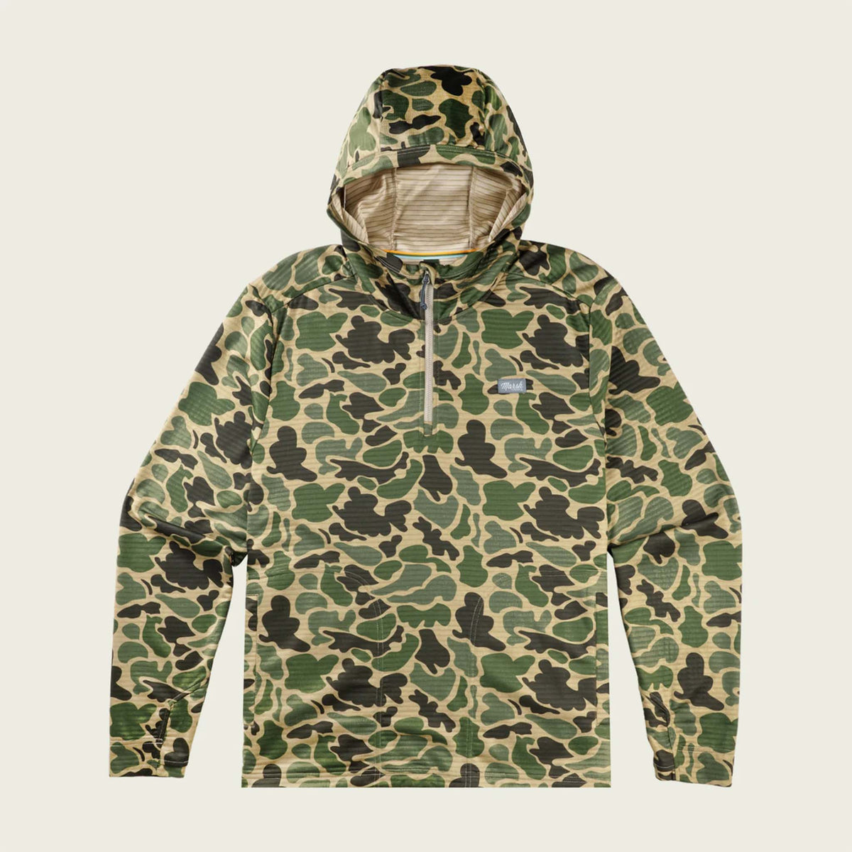 Camouflage-patterned hoodie on a beige background