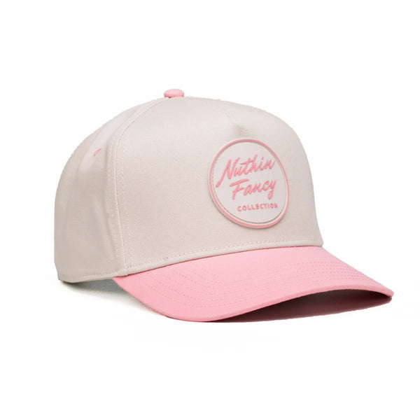 Comus Dolly Trucker Hat in Off White and Pink