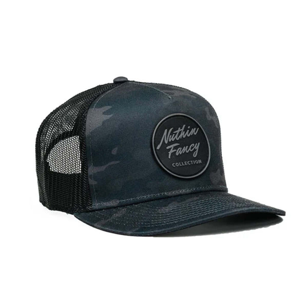 Front view - Stay classic, stay bold. The Pioneer trucker hat by Nuthin Fancy Company features a sharp black camo print with a structured front, mesh back, and adjustable snapback for a custom fit. Finished with the signature Pioneer patch, it’s the perfect mix of everyday comfort and no-nonsense style.
Black camouflage design
Black and gray circle logo patch
Slight pre-curved bill
Plastic snap adjustable snapback
One size fits most