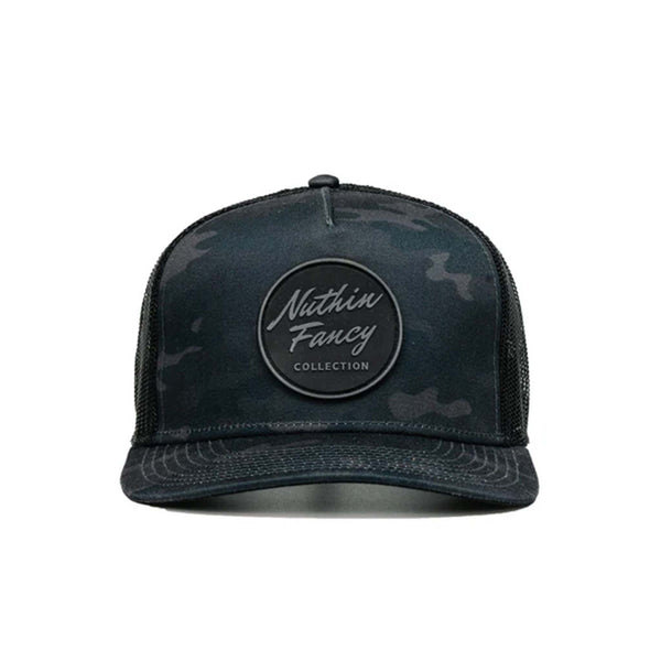 Front view - Stay classic, stay bold. The Pioneer trucker hat by Nuthin Fancy Company features a sharp black camo print with a structured front, mesh back, and adjustable snapback for a custom fit. Finished with the signature Pioneer patch, it’s the perfect mix of everyday comfort and no-nonsense style.
Black camouflage design
Black and gray circle logo patch
Slight pre-curved bill
Plastic snap adjustable snapback
One size fits most