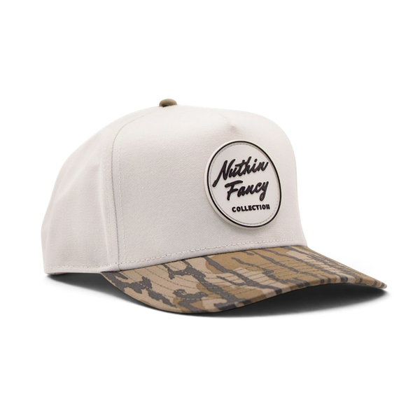 Comus Sticks Trucker Hat in Off White and Bottomland Camo