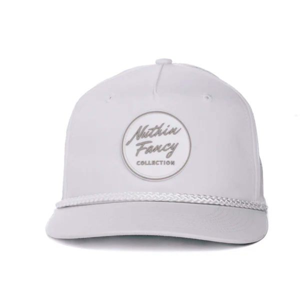 Black performance trucker hat made from moisture-wicking fabric, featuring laser perforated side and back panels for breathability. Includes a white-accented rubber 'Nuthin’ Fancy' patch on the front, a stylish black rope detail above the pre-curved bill, and an adjustable plastic snapback closure. One size fits most (58 cm).