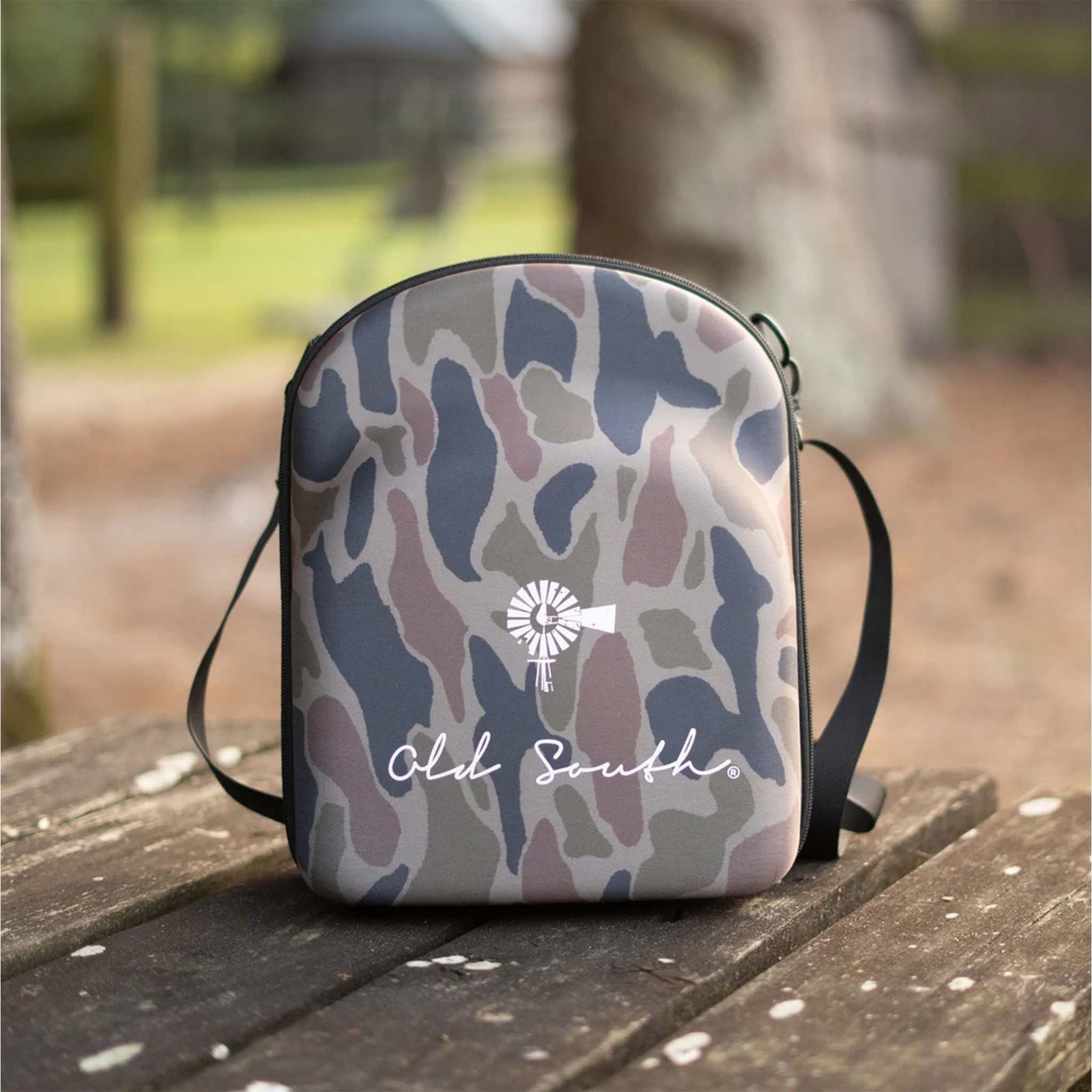 Old South 6 Hat Travel Case in color Thicket Camo.  Old South logo printed in white.
Our Old South - 6 Hat Travel Case is perfect for when you're on the go or in need of storage for your caps. The all-over light weight foam protects your caps from damage and the elements. An out of the way luggage and shoulder strap will fit ensure your hats are not far away!