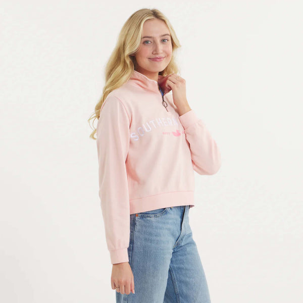 Woman wearing SEAWASH™ Vintage 1/4 zip crewneck in soft cotton with ribbed accents, front YKK ring-pull zipper, and embroidered Southern Marsh logo on chest.