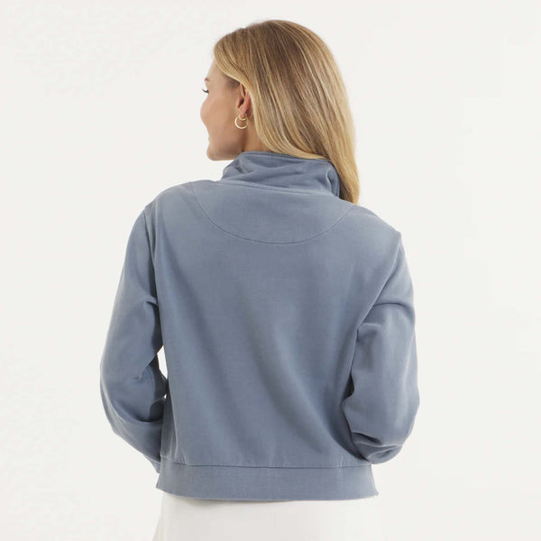 Woman wearing SEAWASH™ Vintage 1/4 zip crewneck in soft cotton with ribbed accents, front YKK ring-pull zipper, and embroidered Southern Marsh logo on chest.