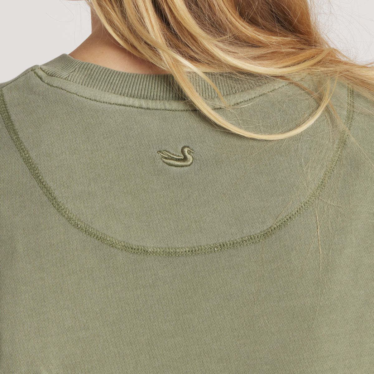 Closeup of back neckline and logo on SEAWASH™ Crewneck Sweatshirt in brigade olive. 