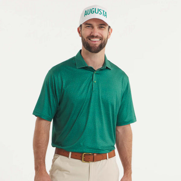 man wearing a green golf southern marsh polo
