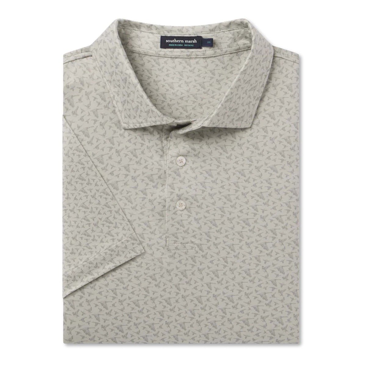 Folded gray patterned polo shirt with a brand label on a white background