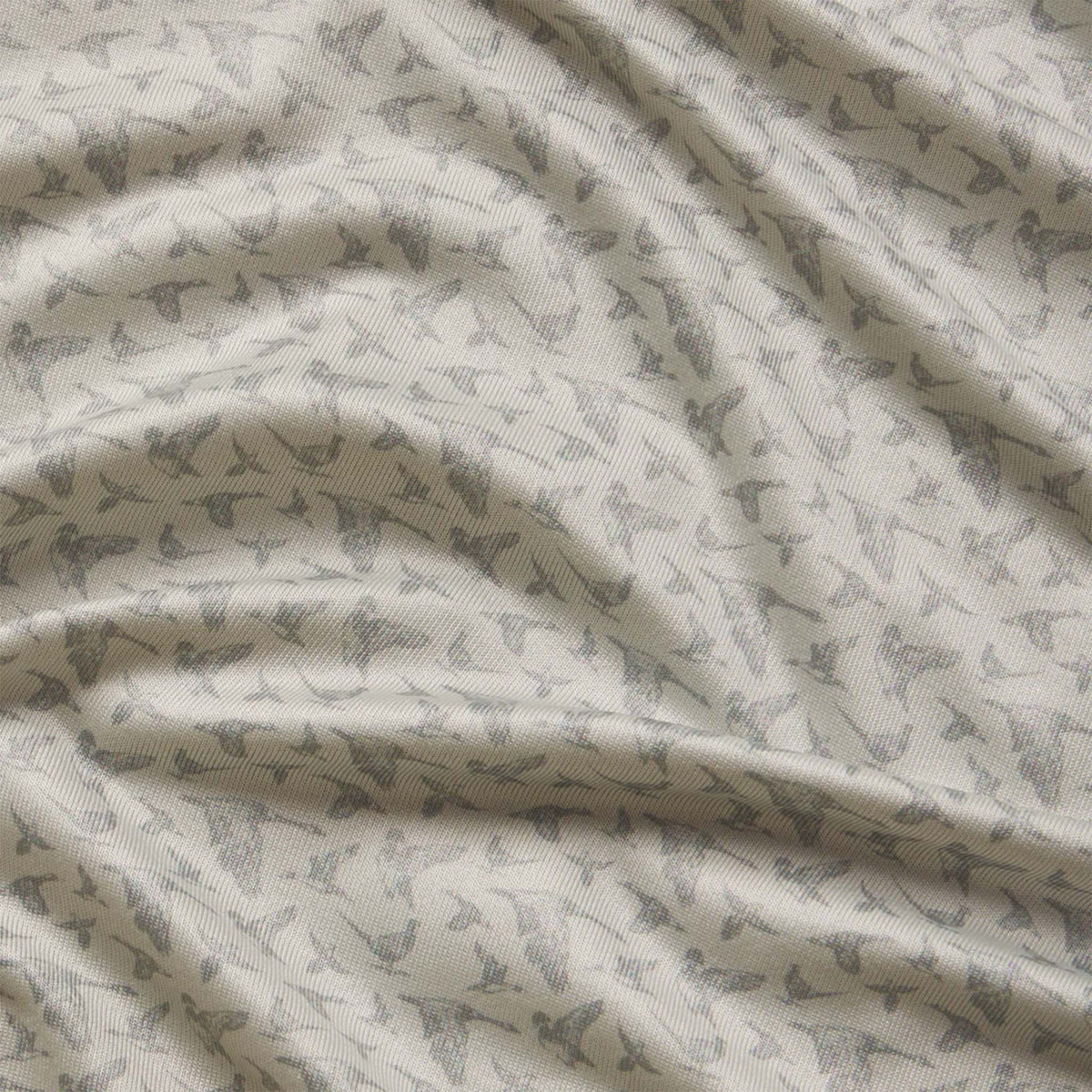 Fabric with a subtle pattern on a neutral background