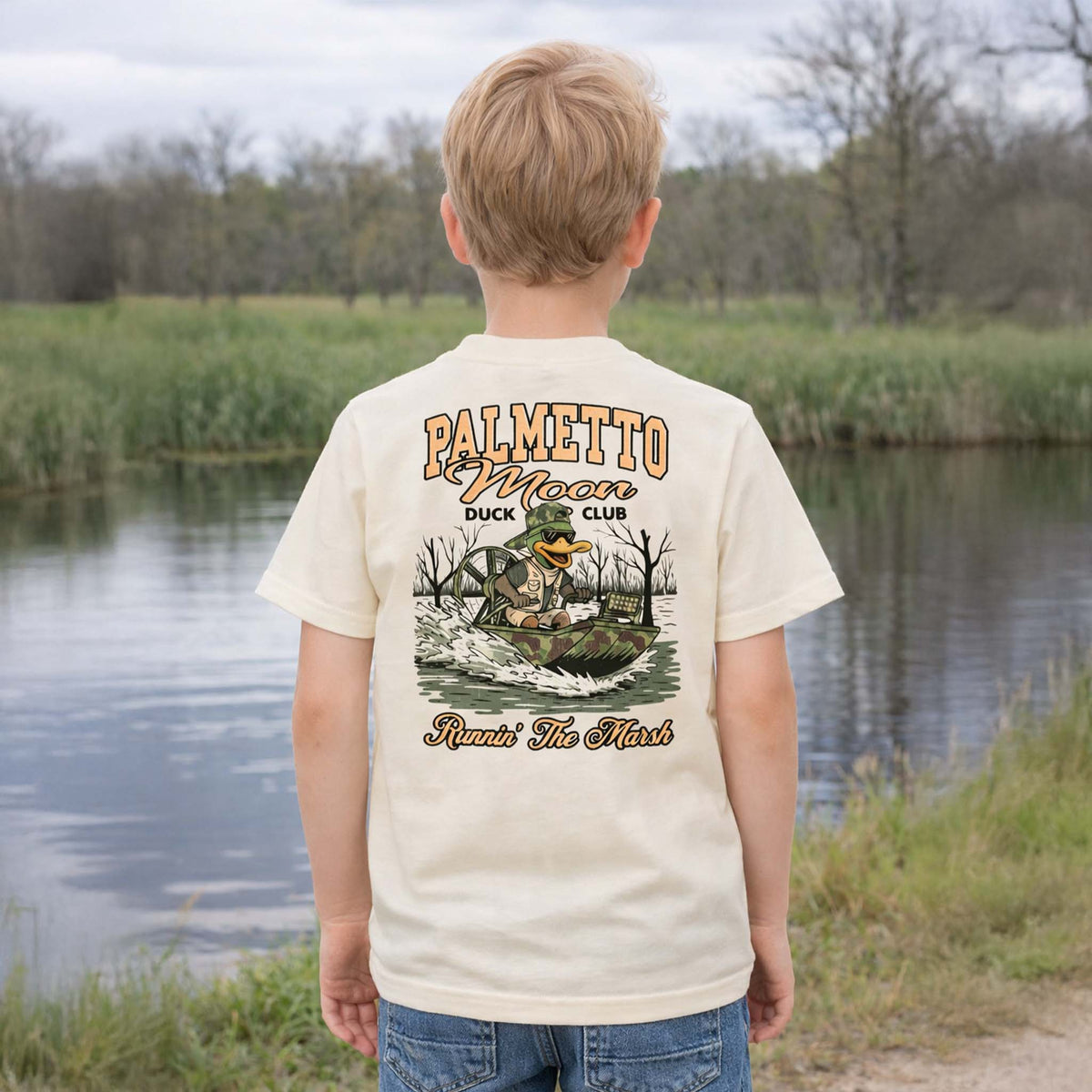 Natural Palmetto Moon youth t-shirt with small duck mascot Palmetto Moon logo printed on the front chest.