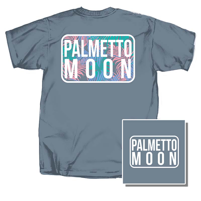 Palmetto Moon Palmetto Light Short Sleeve T-Shirt, color denim, sizes S-XXXL, 100% cotton, unisex sizing.  The back design is a rectangle with curved edges outlined in white with palm frans in shades of pink, teal, and blue with Palmetto Moon typed in capital bold font in the middle.  The front of the shirt has a white outlined rectangle with Palmetto Moon in white, capital font inside on the left chest. 