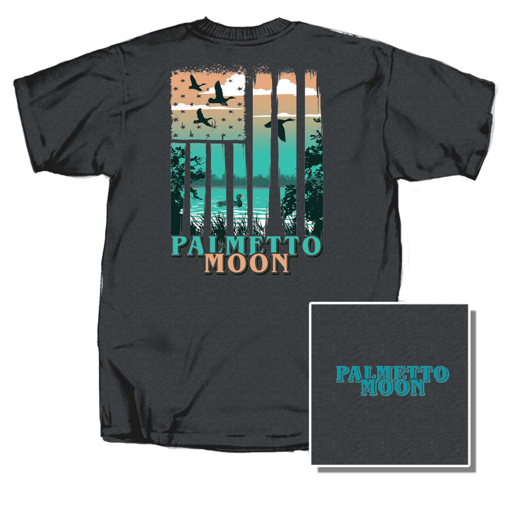 Dark heather gray Palmetto Moon t-shirt with outdoor flag design featuring ducks flying over a lake at sunset, text “Palmetto Moon” in teal and tan.