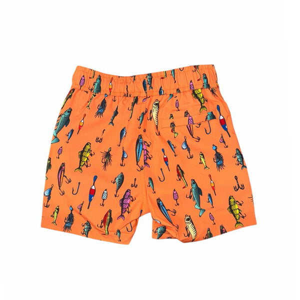 Orange youth swim shorts with fishing lure print, back view showing elastic waistband and back pocket detail.