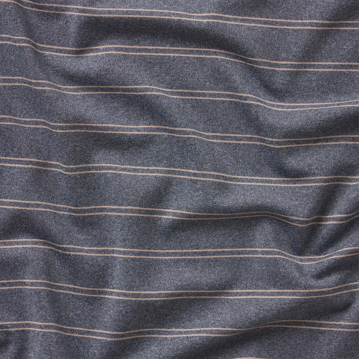 Close-up of gray fabric with thin beige stripes