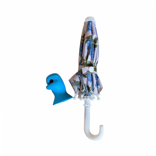 Miniature Umbrella with floral pattern and blue handle on a white background