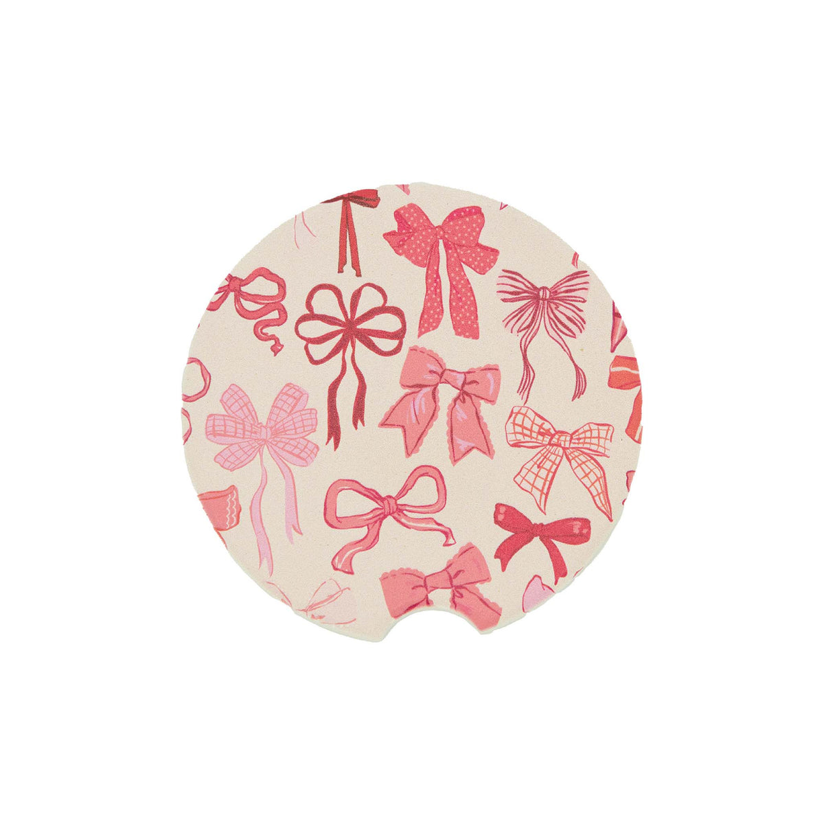 Round car coaster with cut-out notch, featuring a cream background and assorted pink and red bow designs.