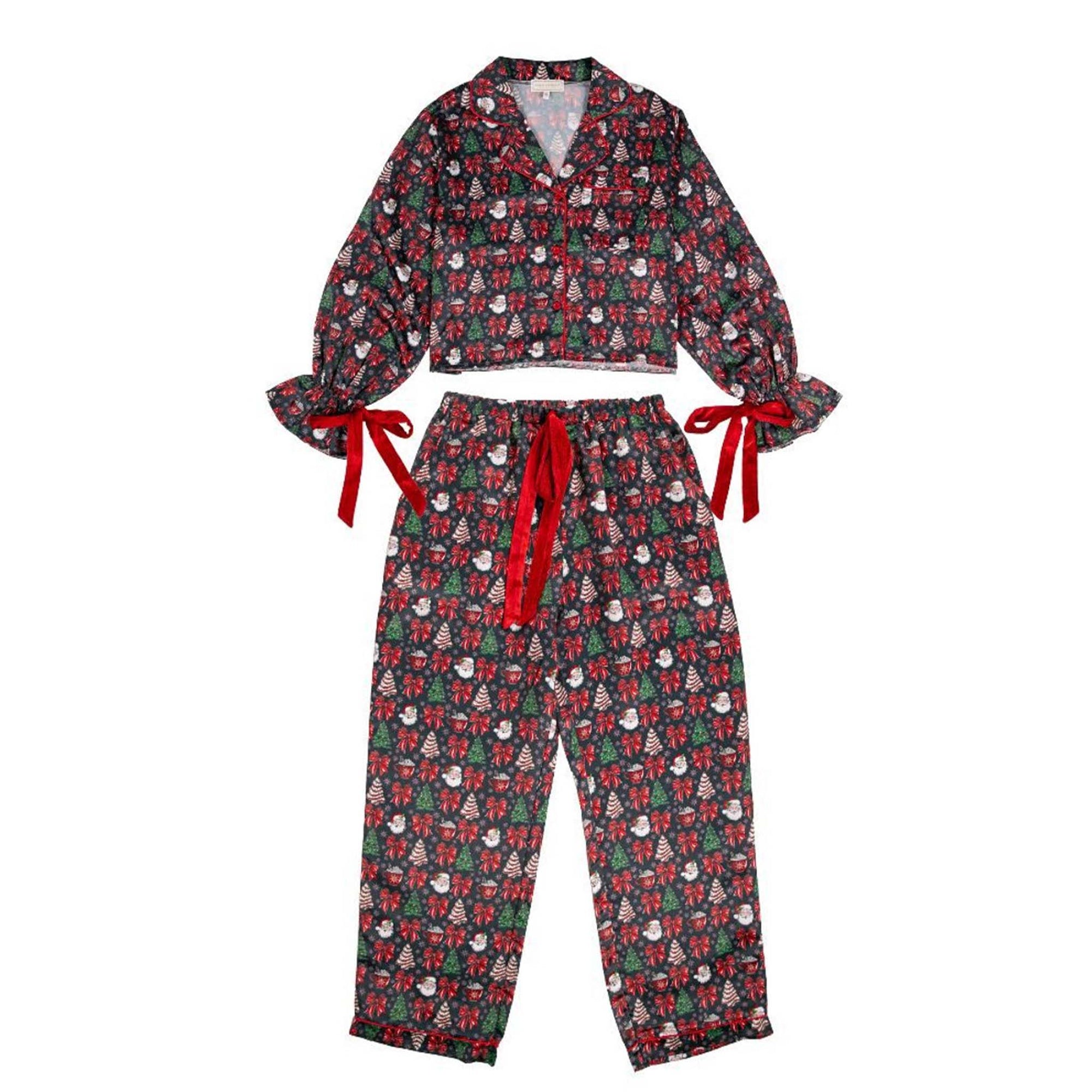Women's long sleeve pajama set with a bow and chirstmas cake design. The sleeves are cuffed with bows and the waistband of the pants has a drawstring.