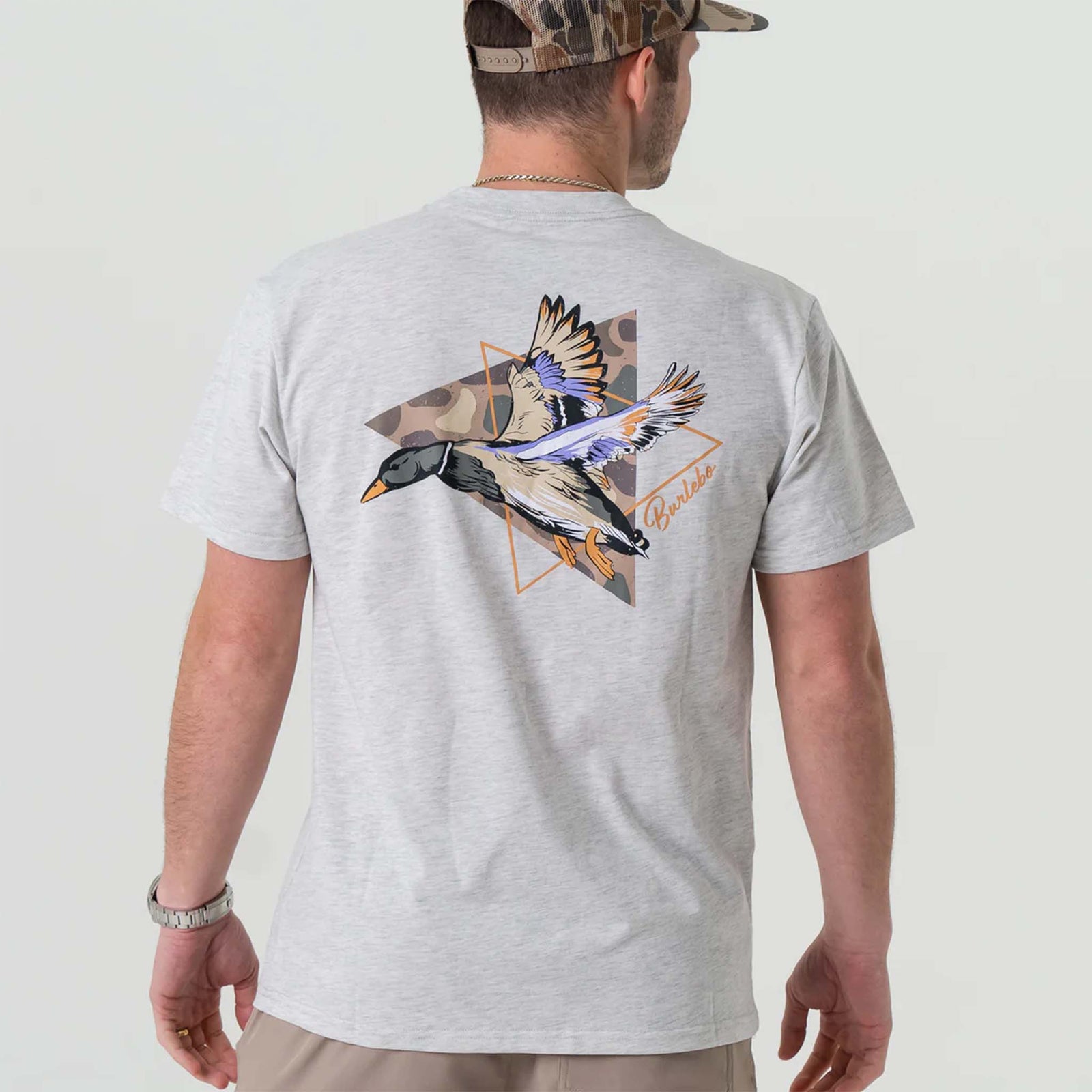 Burlebo t-shirt featuring a bold triangle graphic with a detailed flying duck design, inspired by outdoor adventure and hunting aesthetics.
