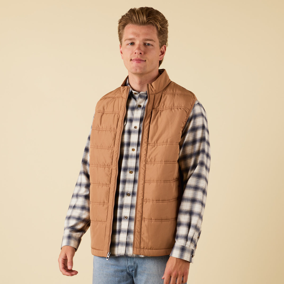 Front view of Coast Apparel Foredeck Vest in Chestnut styled over plaid shirt