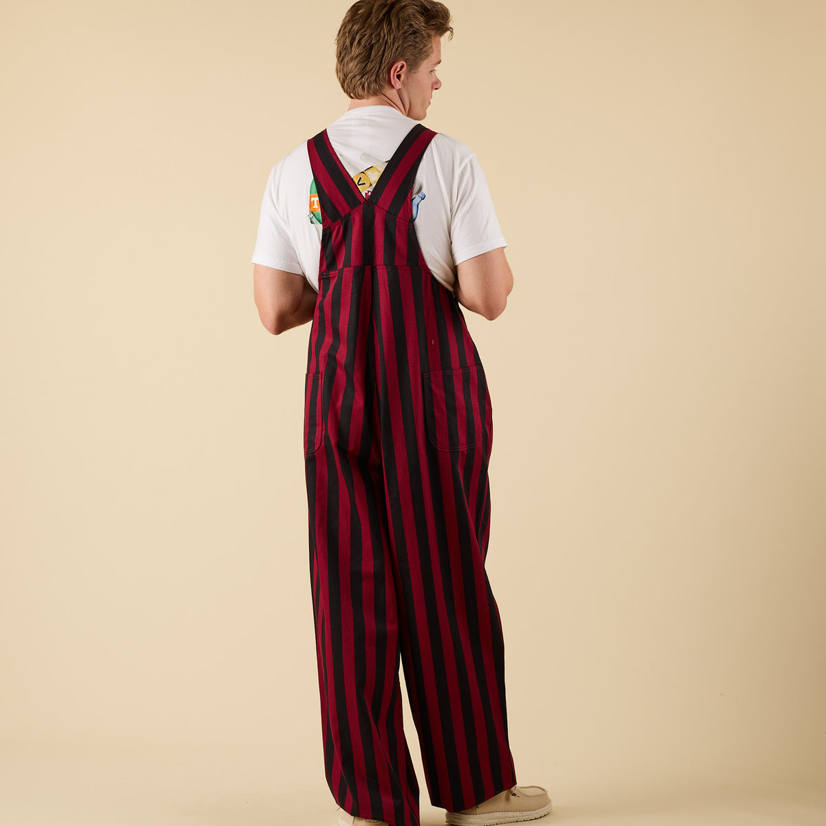 Back view of garnet and black overalls.