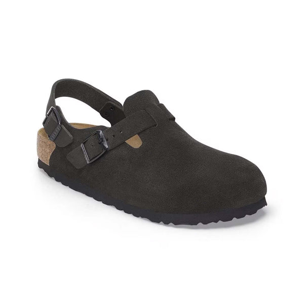Black suede clog shoe with a strap on a white background