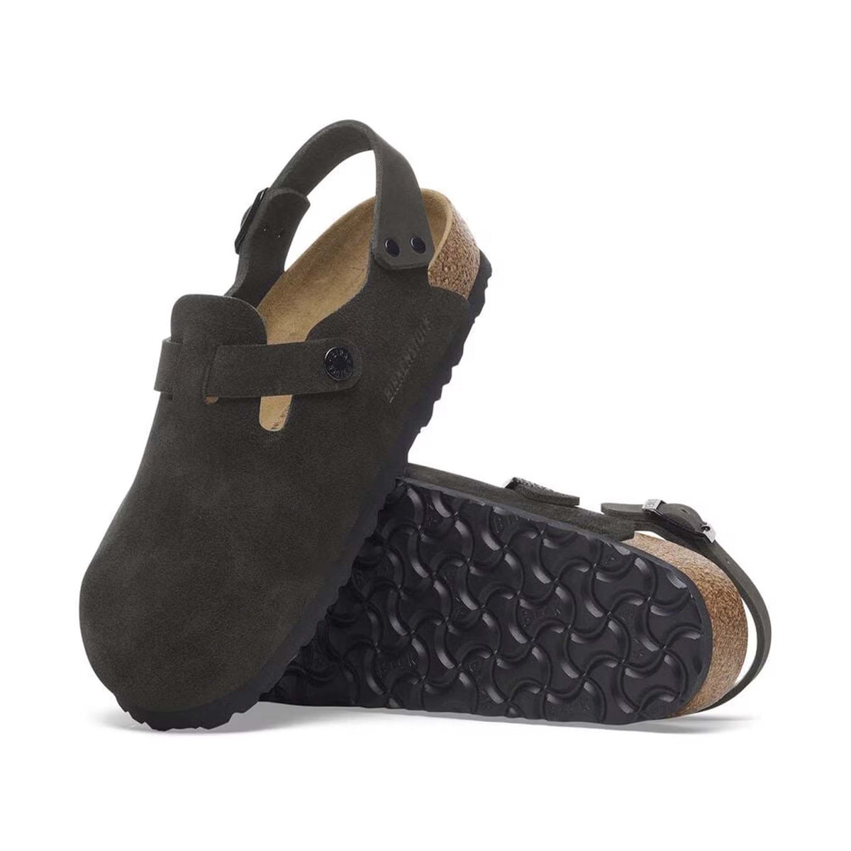 Pair of black suede shoes with a textured sole on a white background