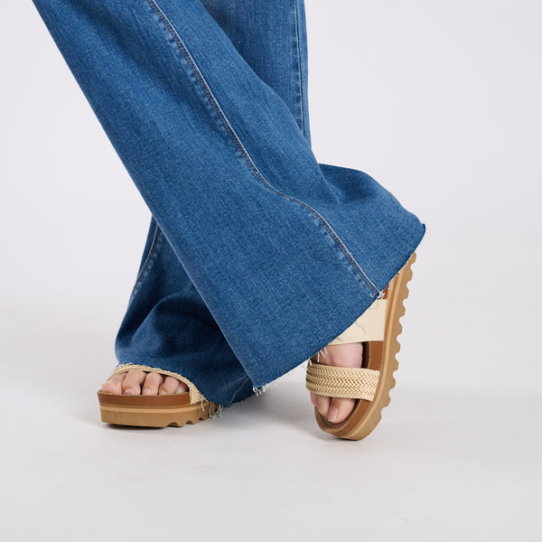 Mid Rise Raw Cut Medium Wash Jeans
