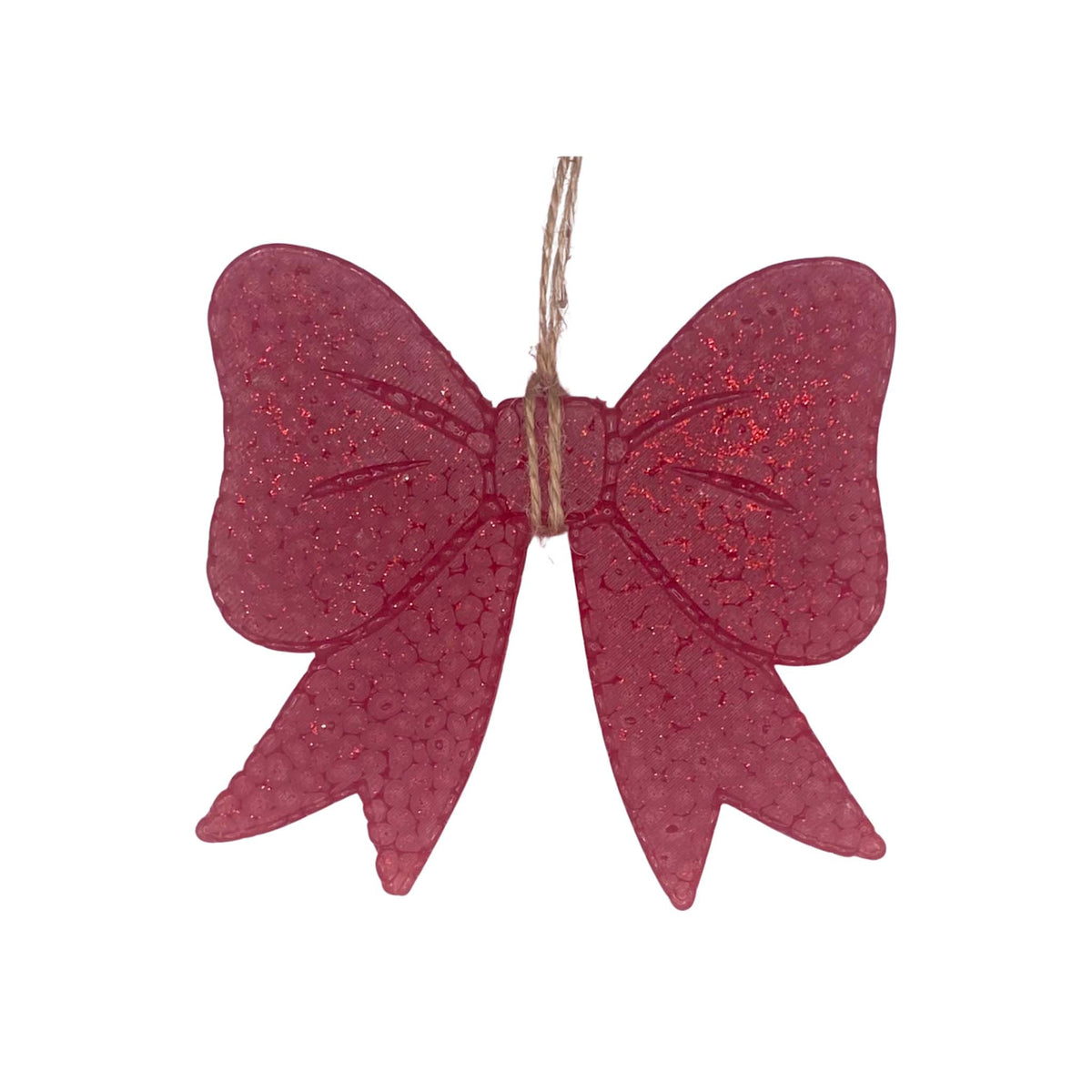 Red bow-shaped air freshener with textured surface and twine loop for hanging.