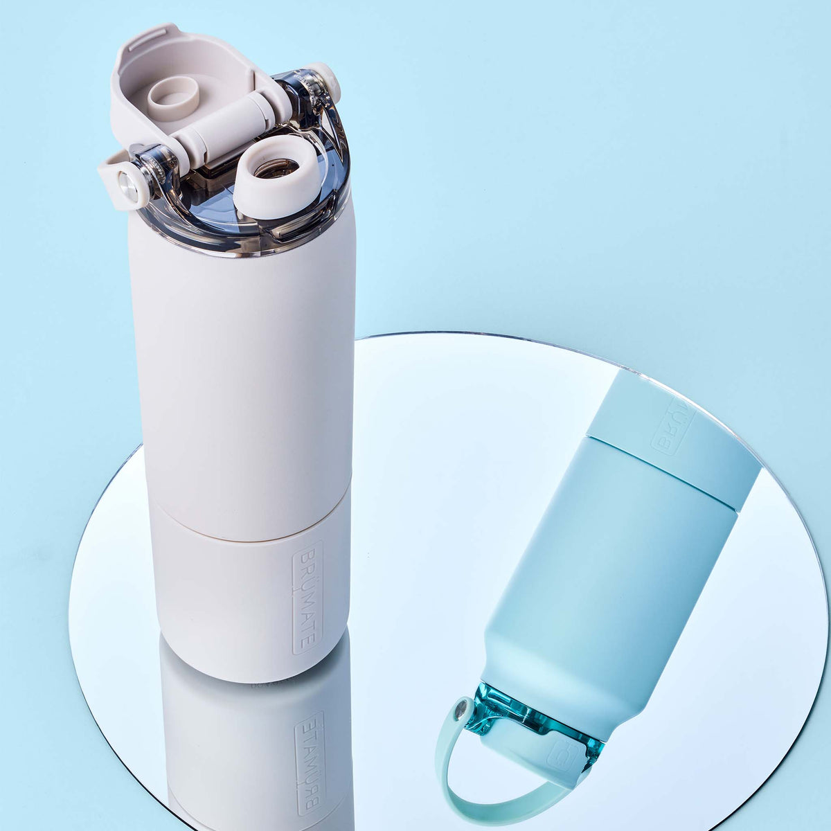 Image showing Brumate Rise 25oz Dune with top flipped up displaying opening.