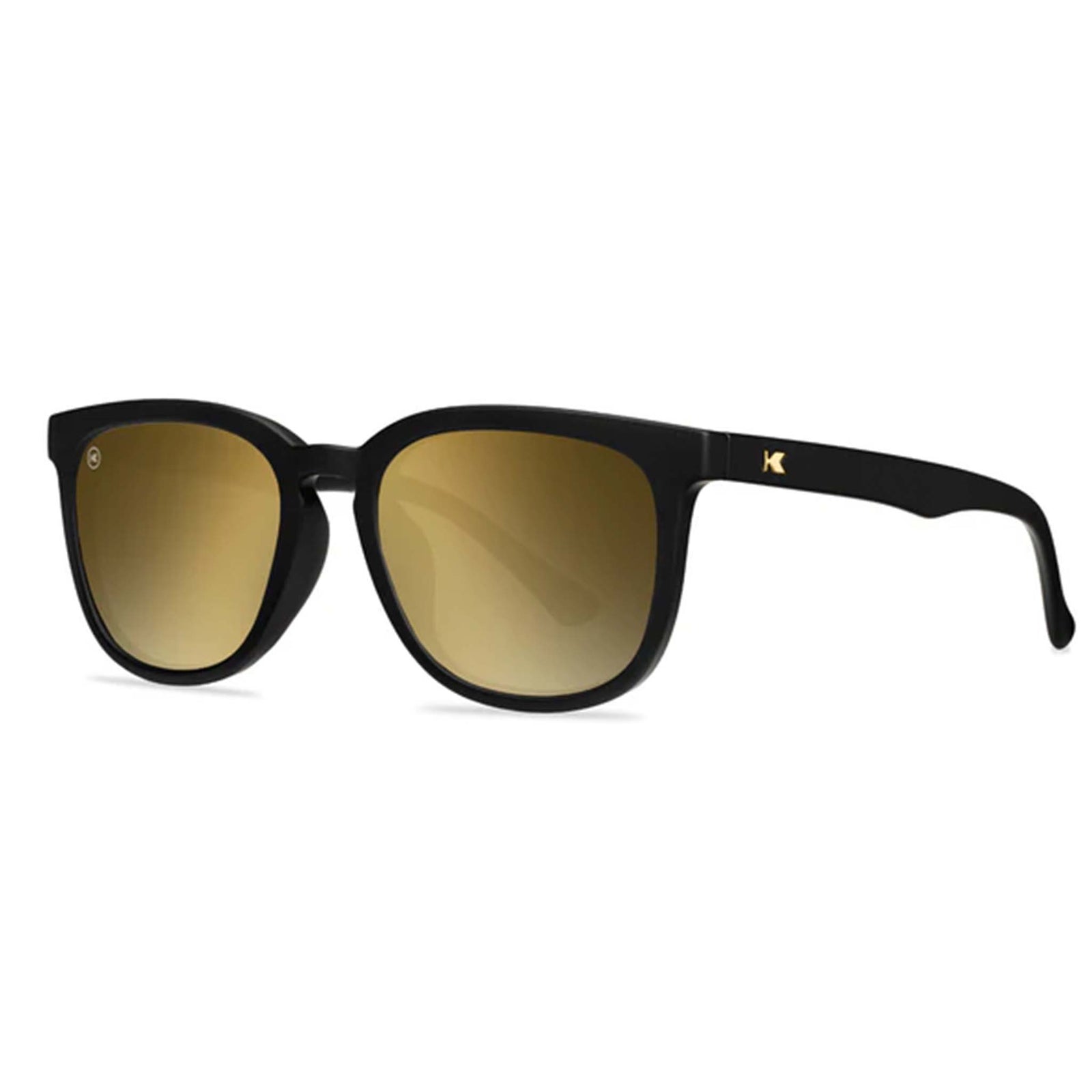 Black sunglasses with gold gradient lenses on a white background