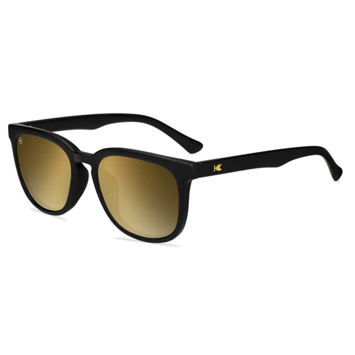 Black sunglasses with gold-tinted lenses on a white background