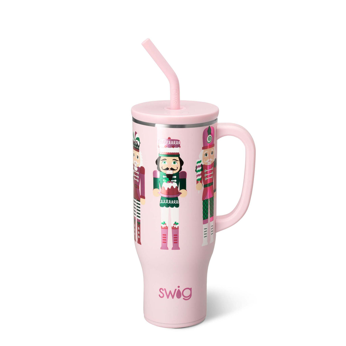 Pink tumbler with nutcracker design and straw on a white background